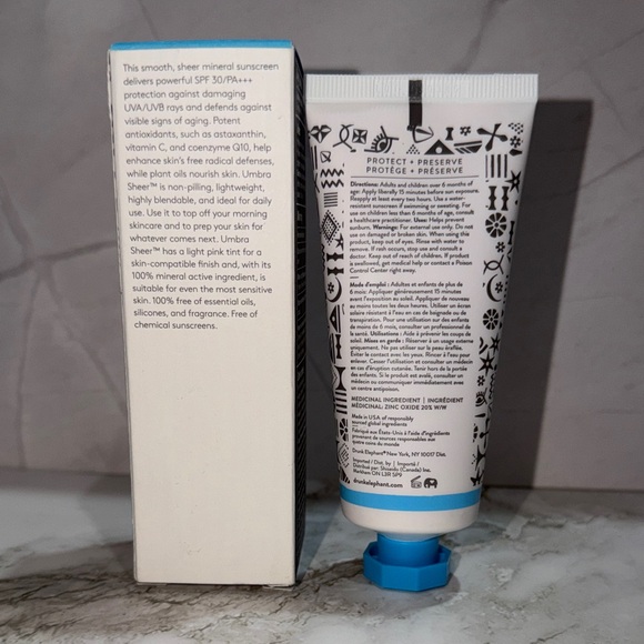 Drunk Elephant Skincare Trio with White, Pink, Yellow, Blue Accents - Picture 2 of 5